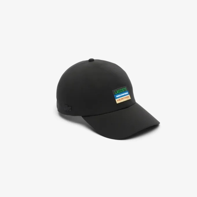 Casquette unisexe imperméable avec écusson Casquette unisexe imperméable avec écusson