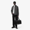 Casquette unisexe imperméable avec écusson Casquette unisexe imperméable avec écusson