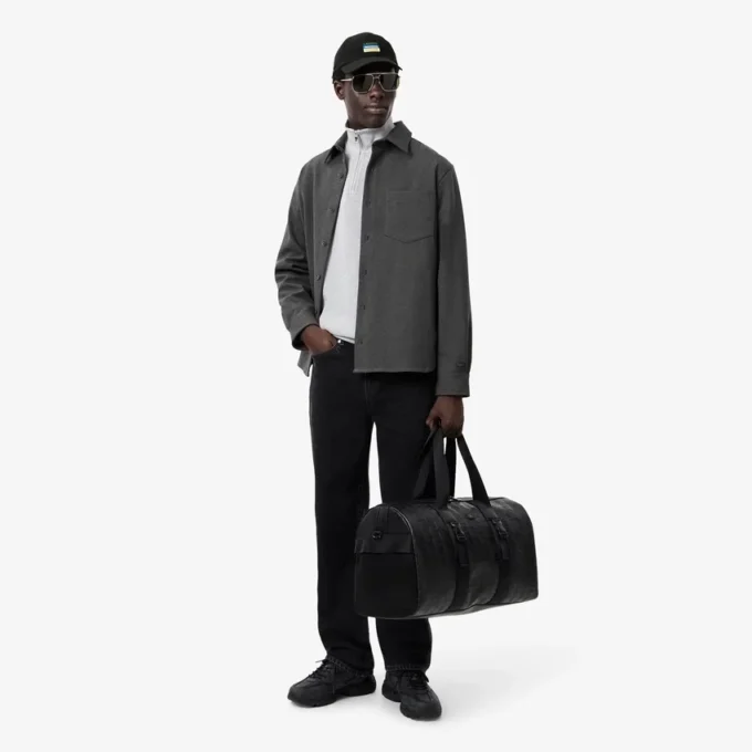 Casquette unisexe imperméable avec écusson Casquette unisexe imperméable avec écusson