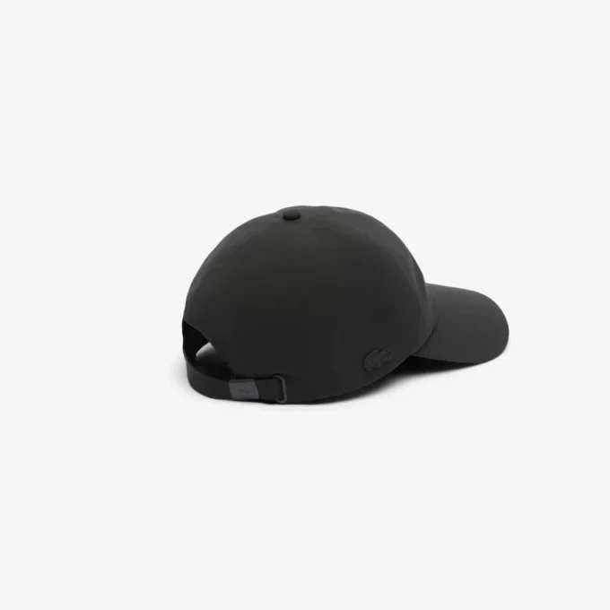 Casquette unisexe imperméable avec écusson Casquette unisexe imperméable avec écusson