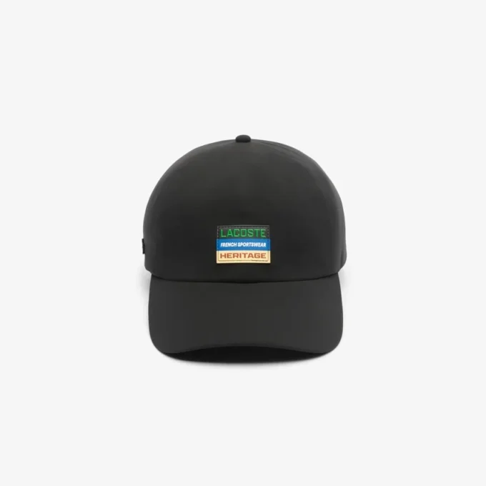 Casquette unisexe imperméable avec écusson Casquette unisexe imperméable avec écusson