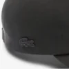 Casquette unisexe imperméable avec écusson Casquette unisexe imperméable avec écusson