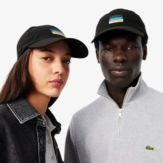 Casquette unisexe imperméable avec écusson Casquette unisexe imperméable avec écusson