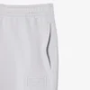 Pantalon de survêtement avec logo en relief Pantalon de survêtement avec logo en relief