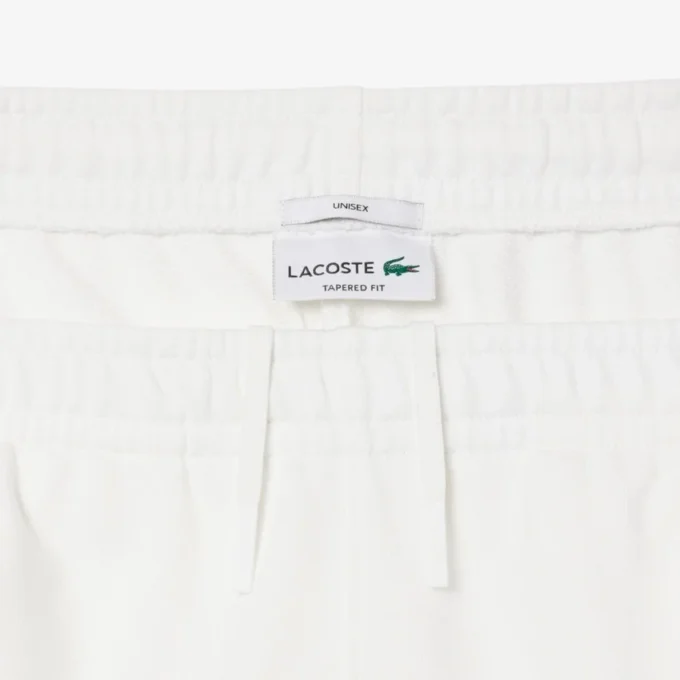 Pantalon de survêtement avec logo en relief Pantalon de survêtement avec logo en relief