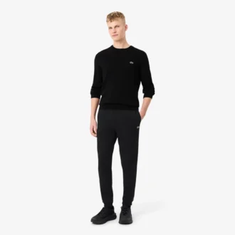 Pantalon de survêtement à rayures et logo