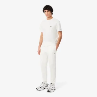 Pantalon de survêtement à rayures et logo