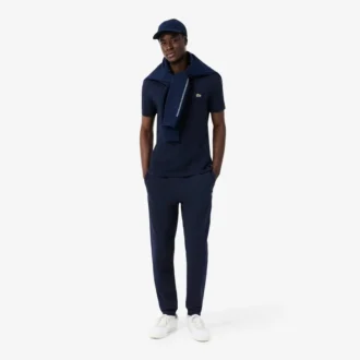 Pantalon de survêtement à rayures et logo