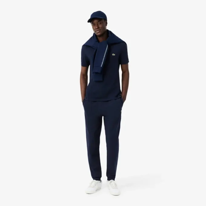 Pantalon de survêtement à rayures et logo