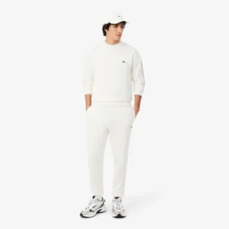 Pantalon de survêtement à rayures et logo