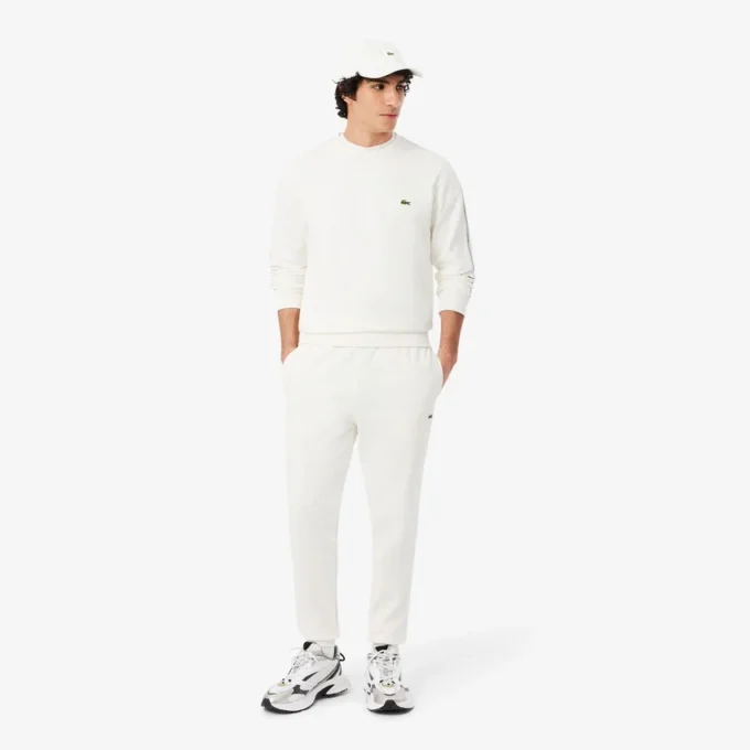 Pantalon de survêtement à rayures et logo Pantalon de survêtement à rayures et logo