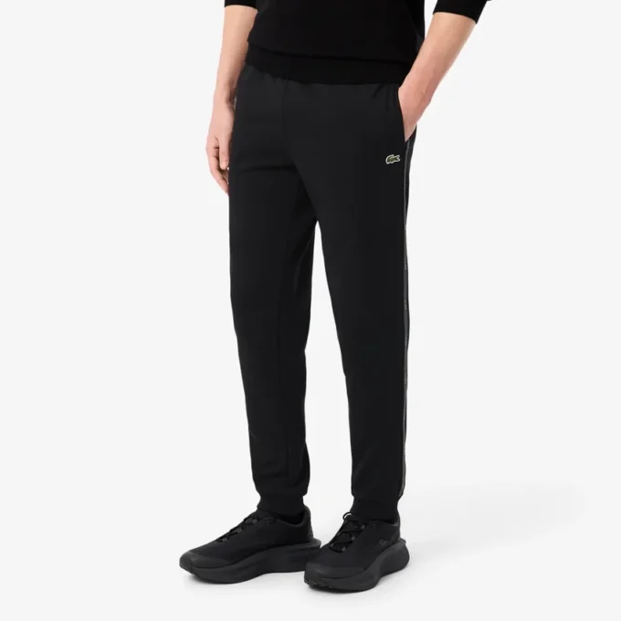 Pantalon de survêtement à rayures et logo Pantalon de survêtement à rayures et logo