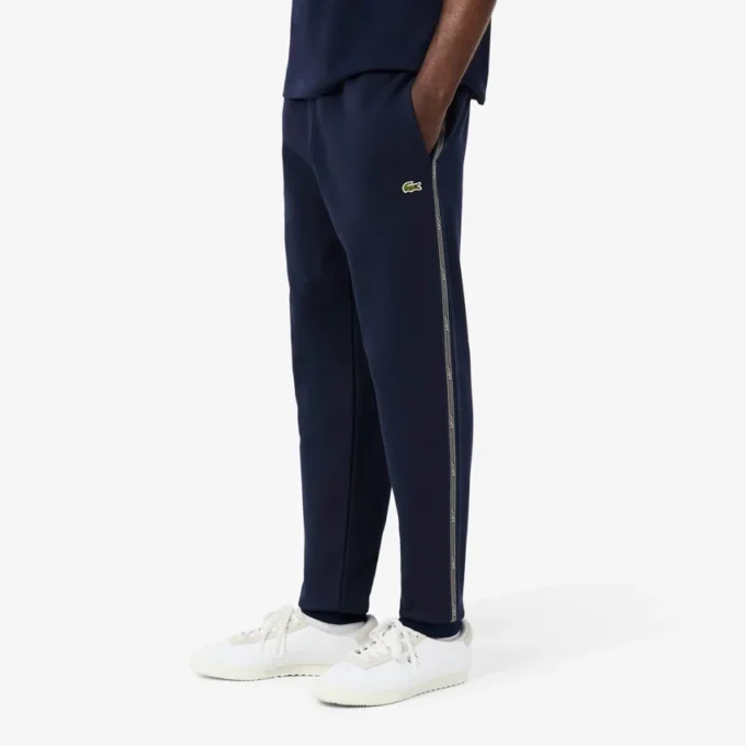 Pantalon de survêtement à rayures et logo
