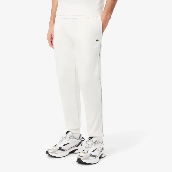 Pantalon de survêtement à rayures et logo Pantalon de survêtement à rayures et logo