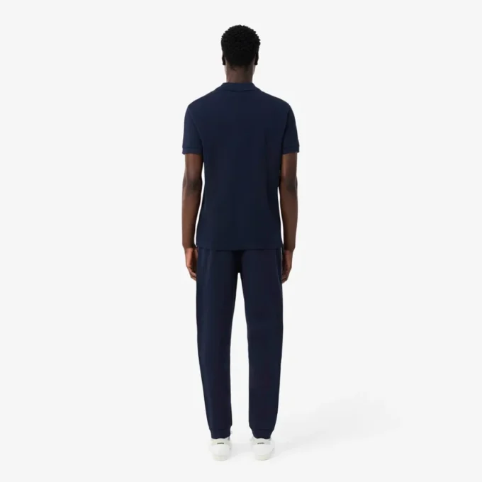 Pantalon de survêtement à rayures et logo