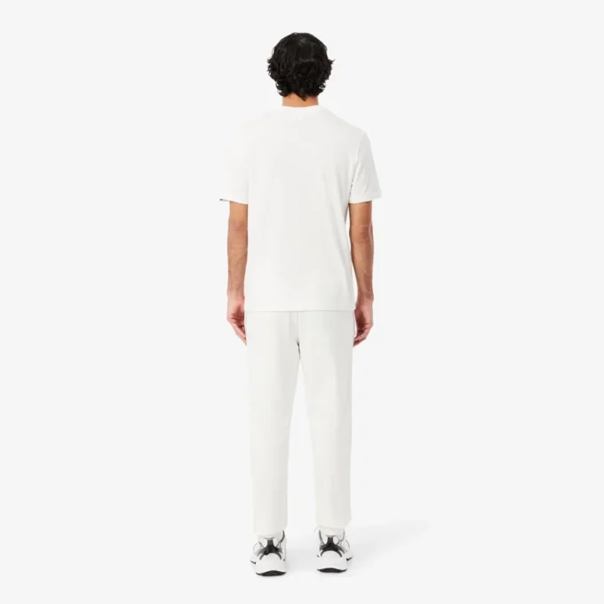 Pantalon de survêtement à rayures et logo Pantalon de survêtement à rayures et logo