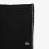 Pantalon de survêtement à rayures et logo Pantalon de survêtement à rayures et logo
