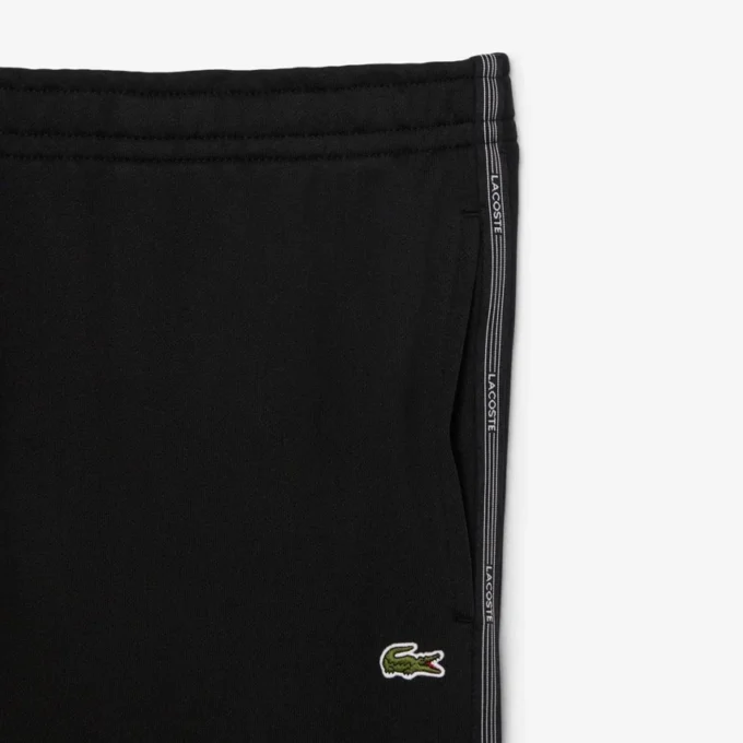 Pantalon de survêtement à rayures et logo Pantalon de survêtement à rayures et logo