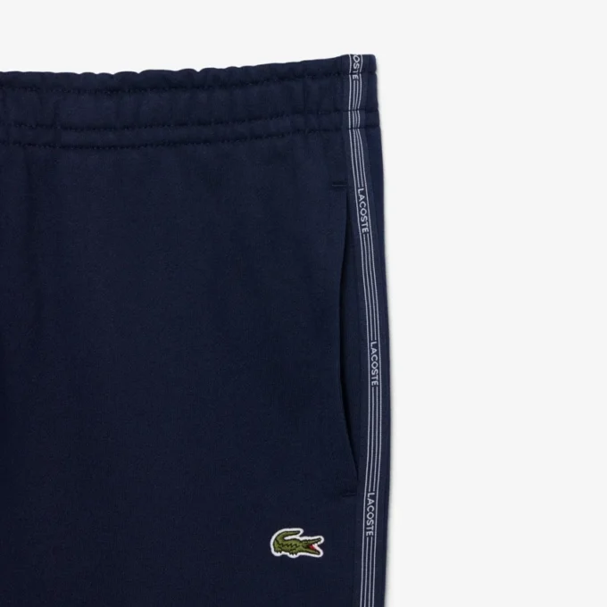 Pantalon de survêtement à rayures et logo