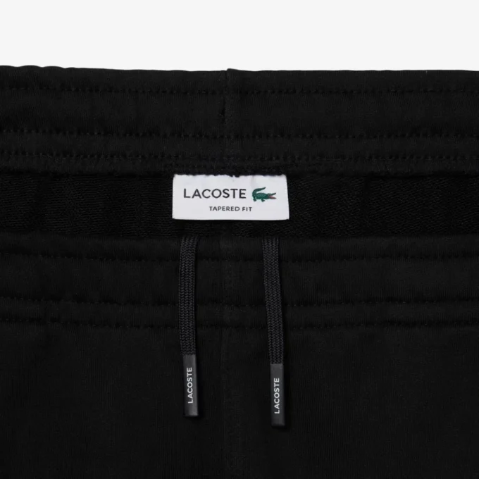 Pantalon de survêtement à rayures et logo Pantalon de survêtement à rayures et logo