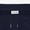 Pantalon de survêtement à rayures et logo