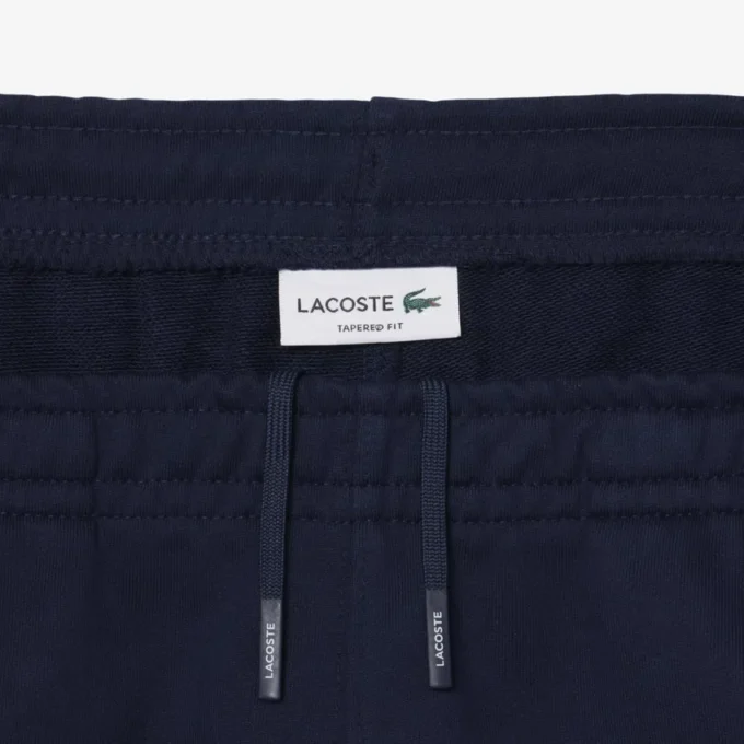 Pantalon de survêtement à rayures et logo