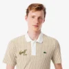 Polo de golf rayé thermorégulateur pour homme Polo de golf rayé thermorégulateur pour homme
