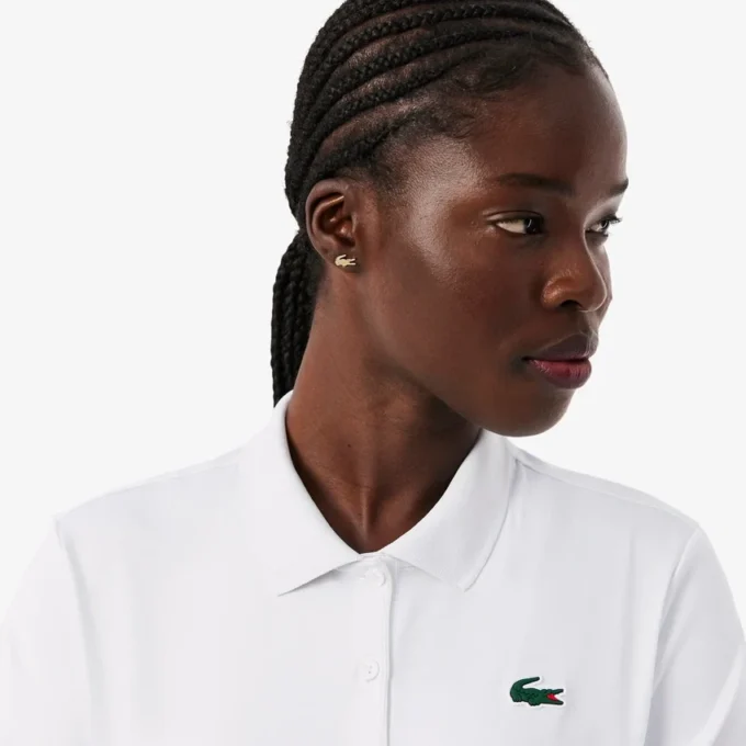 Polo de golf slim fit stretch avec protection UV Polo de golf slim fit stretch avec protection UV