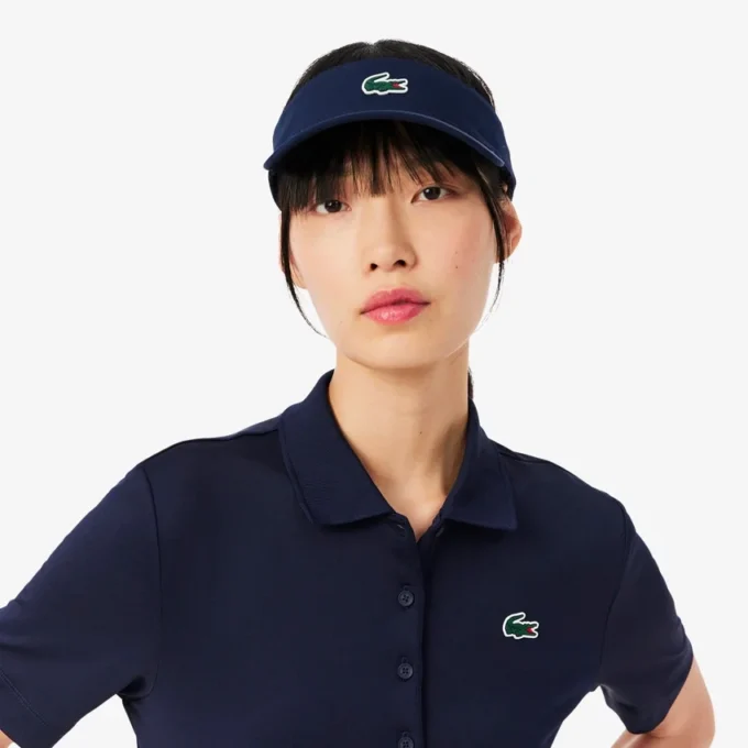 Polo de golf slim fit stretch avec protection UV Polo de golf slim fit stretch avec protection UV