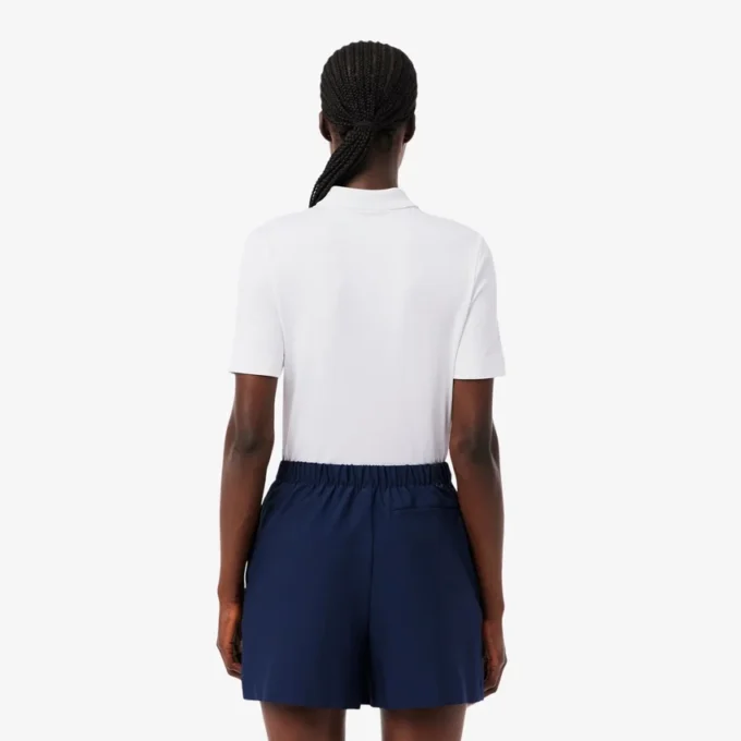 Polo de golf slim fit stretch avec protection UV Polo de golf slim fit stretch avec protection UV