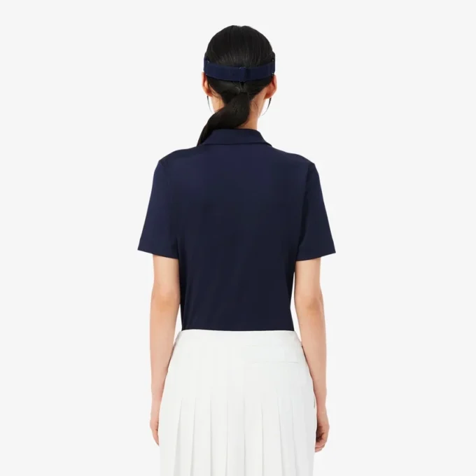 Polo de golf slim fit stretch avec protection UV Polo de golf slim fit stretch avec protection UV