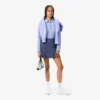 Polo de golf thermorégulateur et anti-UV pour femme Polo de golf thermorégulateur et anti-UV pour femme