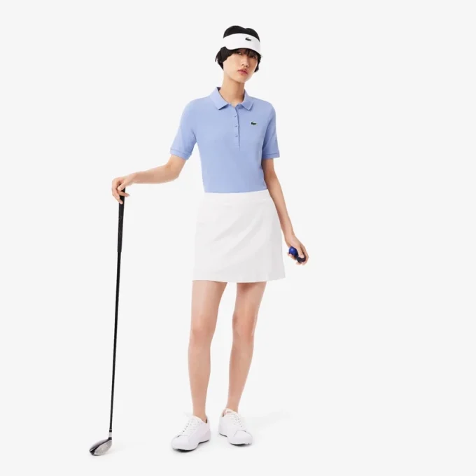 Polo de golf thermorégulateur slim fit pour femme Polo de golf thermorégulateur slim fit pour femme