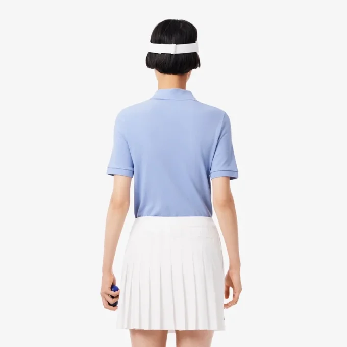 Polo de golf thermorégulateur slim fit pour femme Polo de golf thermorégulateur slim fit pour femme