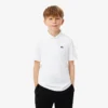 Polo de sport Ultra Dry en jersey pour garçon Polo de sport Ultra Dry en jersey pour garçon