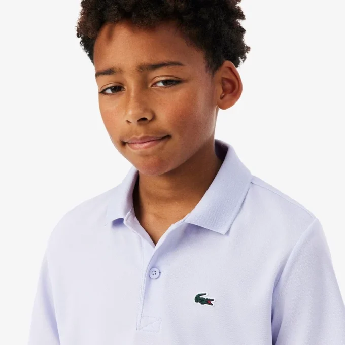 Polo de sport Ultra Dry en jersey pour garçon Polo de sport Ultra Dry en jersey pour garçon
