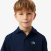 Polo de sport Ultra Dry en jersey pour garçon Polo de sport Ultra Dry en jersey pour garçon