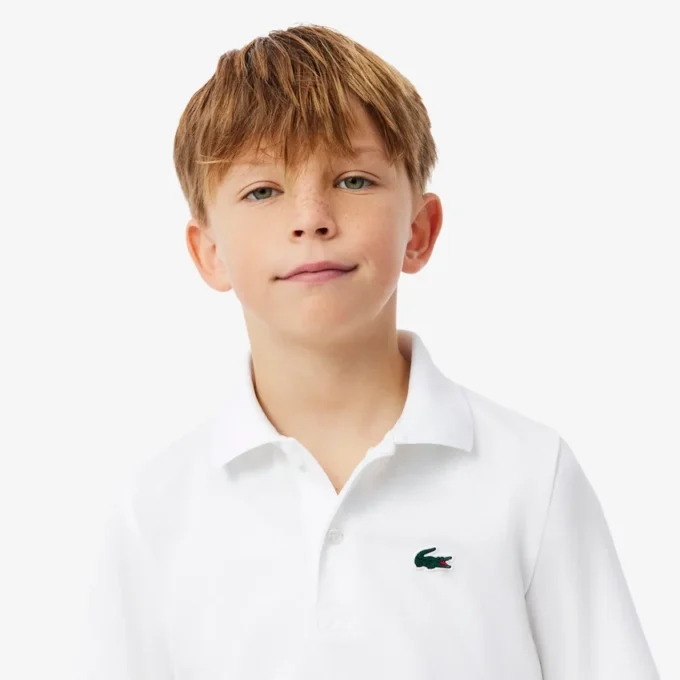 Polo de sport Ultra Dry en jersey pour garçon Polo de sport Ultra Dry en jersey pour garçon
