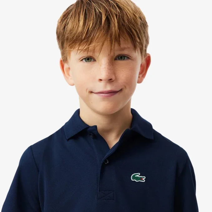 Polo de sport Ultra Dry en jersey pour garçon Polo de sport Ultra Dry en jersey pour garçon