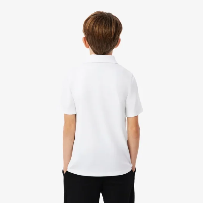 Polo de sport Ultra Dry en jersey pour garçon Polo de sport Ultra Dry en jersey pour garçon