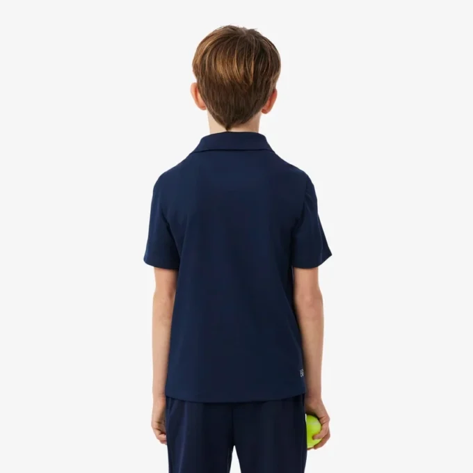 Polo de sport Ultra Dry en jersey pour garçon Polo de sport Ultra Dry en jersey pour garçon