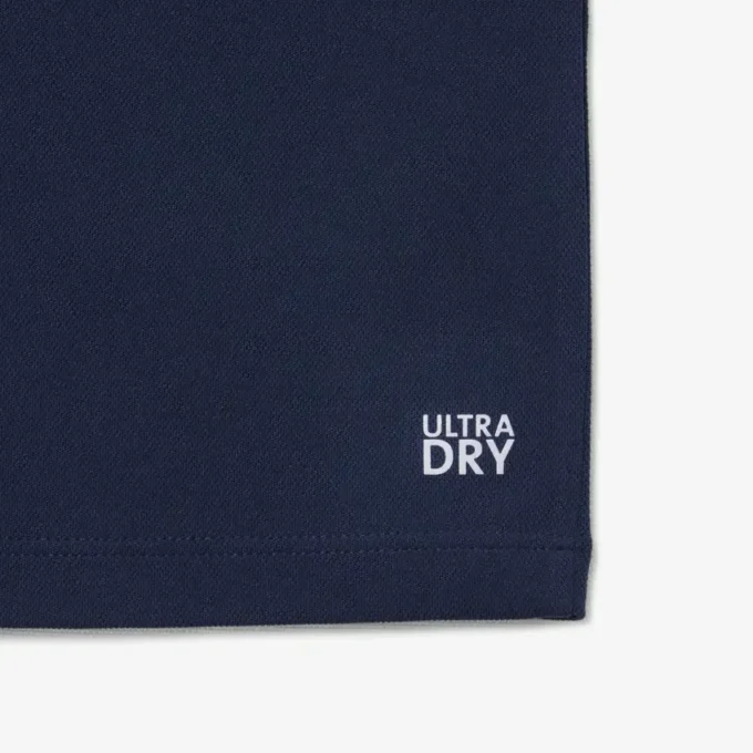Polo de sport Ultra Dry en jersey pour garçon Polo de sport Ultra Dry en jersey pour garçon