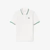 Polo de tennis à col rayé avec protection UV pour femme Polo de tennis à col rayé avec protection UV pour femme