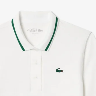 Polo de tennis à col rayé avec protection UV pour femme