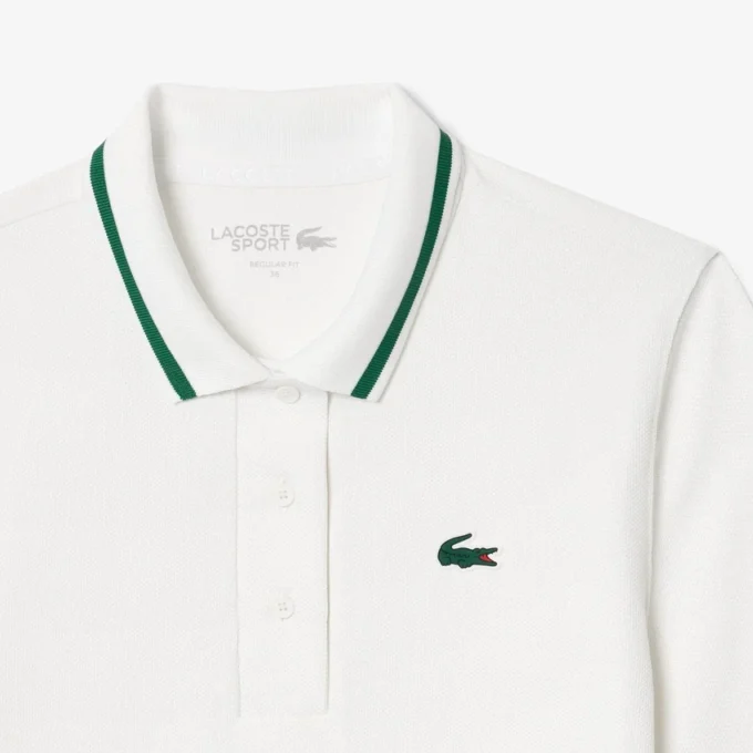 Polo de tennis à col rayé avec protection UV pour femme Polo de tennis à col rayé avec protection UV pour femme