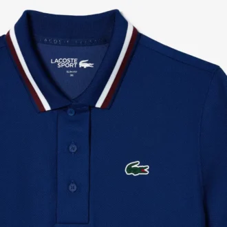 Polo de tennis à col rayé avec protection UV pour femme