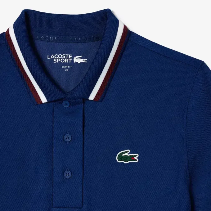 Polo de tennis à col rayé avec protection UV pour femme Polo de tennis à col rayé avec protection UV pour femme