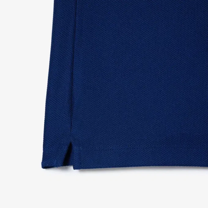 Polo de tennis à col rayé avec protection UV pour femme Polo de tennis à col rayé avec protection UV pour femme