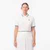 Polo de tennis à col rayé avec protection UV pour femme Polo de tennis à col rayé avec protection UV pour femme