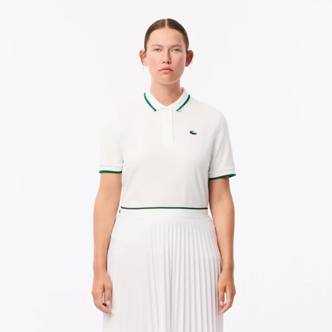Polo de tennis à col rayé avec protection UV pour femme Polo de tennis à col rayé avec protection UV pour femme